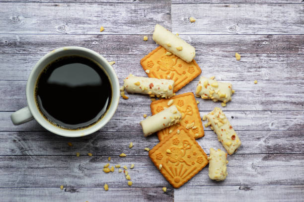 istock cup of aromatic coffee and cookies 1235653669