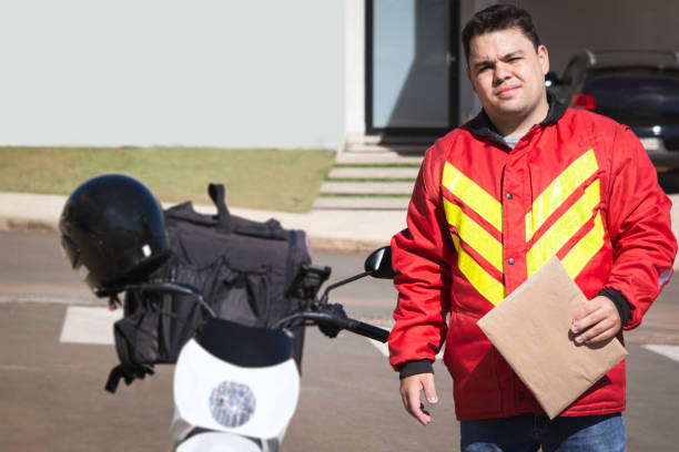 istock Man working as motoboy. Delivering with a motorcycle. 1235693547