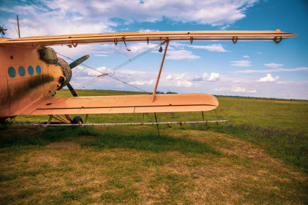 istock Agricultural plane is standing on a field 1235719095