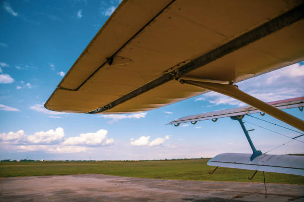 istock Agricultural plane is standing on a field 1235720636