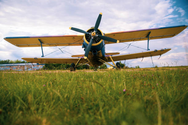 istock Agricultural plane is standing on a field 1235722202