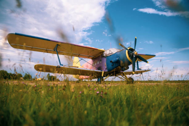 istock Agricultural plane is standing on a field 1235722880