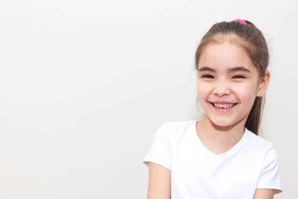 istock Funny Smiling Small Girl 1235748914