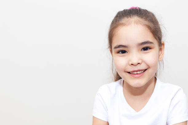 istock Smiling Cute Small Girl 1235748919