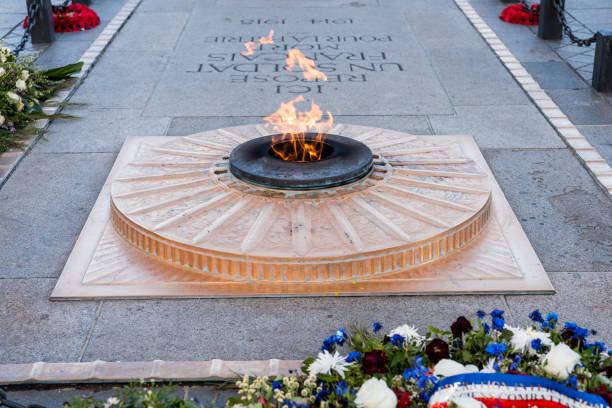 The flame of the unknown soldier under the Arc de Triomphe stock photo