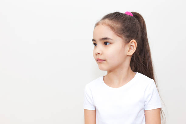 istock Curious Little Girl Copy Space 1235781702