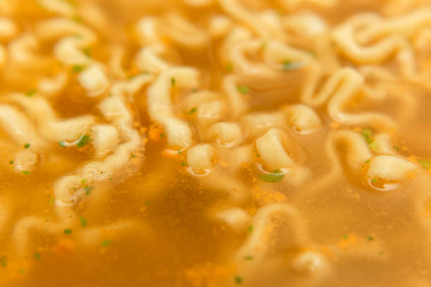 closeup noodle soup with seasoning