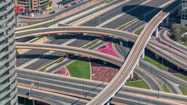 istock Aerial view of highway interchange in Dubai downtown timelapse 1235790068
