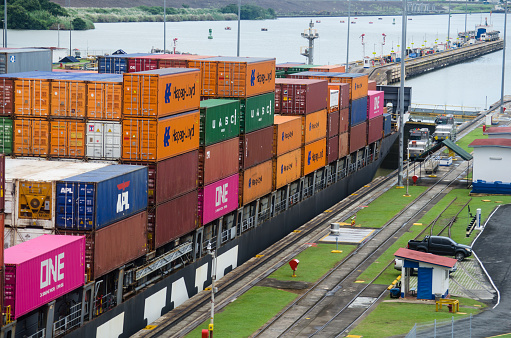 Miraflores Locks, Panama - Sep 22, 2019: Detail of a cargo ship transiting through the Miraflores Locks in the Panamana Canal from the Pacific side to the Caribbean side.