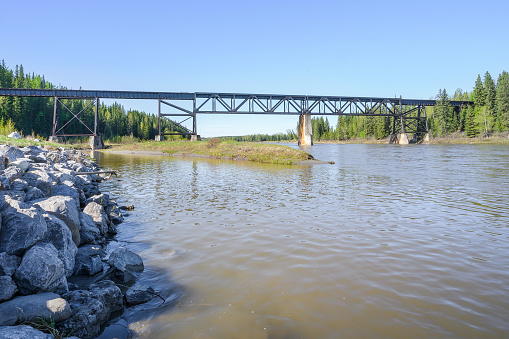 Train bridge over the North Saskatchewan River at the town of Rocky Mountain House in Alberta, Canada