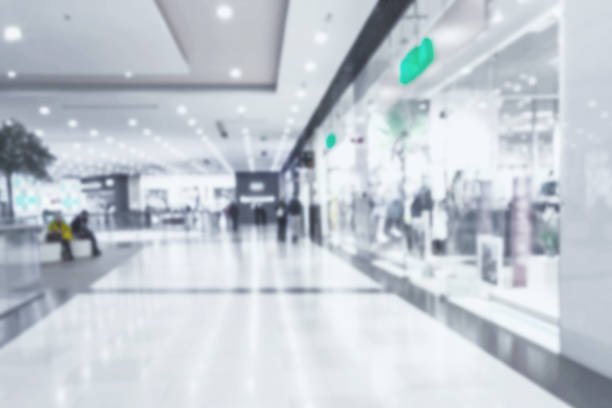 Abstract blur and bokeh beautiful luxury shopping mall and department store interior for background