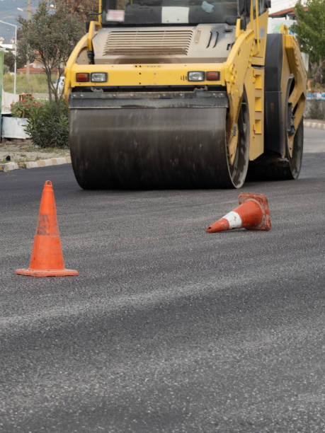 istock New asphalt road. Road asphalt works. Construction works. 1235833578