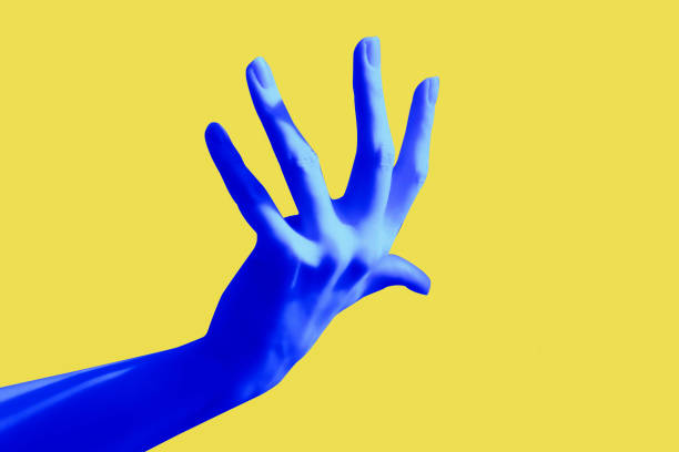 istock Blue hand gesture on yellow background poster. Beautiful fingers. 1235873039