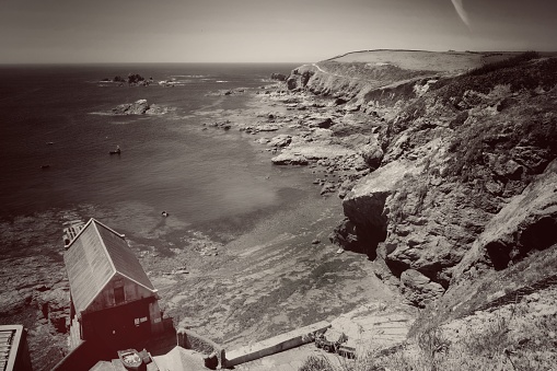 Black and white image of the coast at the UK’s most southerly point at the Lizard Peninsula,Cornwall.
