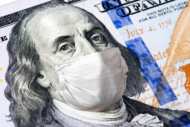 istock Benjamin Franklin uses a surgical mask for Covid-19 1235893159