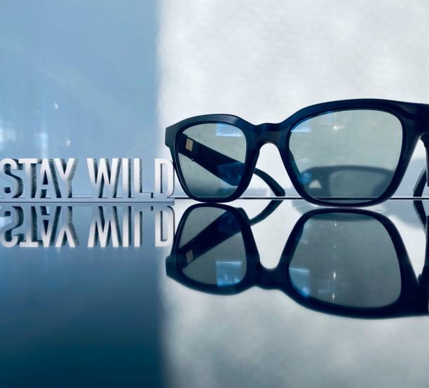 istock Black sunglasses and text: stay wild 1235917381