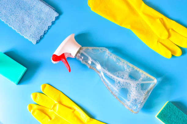 istock the cleaning supplies, the layout on a blue background 1235928285