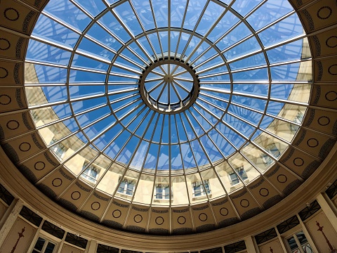 Rotunda of Galerie Colbert, is one of the most beautiful covered passage in Paris, near National Institut of Art History, Galerie Vivienne and Palais Royal, Comédie Française. Paris in deuxième arrondissement (2nd district) – France .