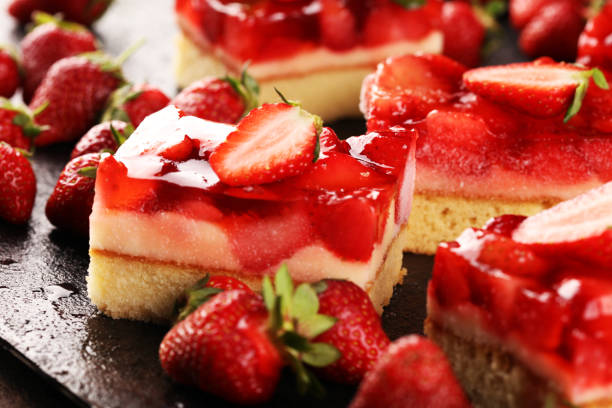 istock strawberry cake and many fresh strawberries on rustic background table 1235998910
