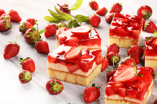 strawberry cake and many fresh strawberries