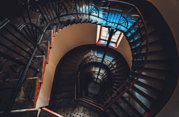 istock Destroyed spiral staircase indoors 1236013777