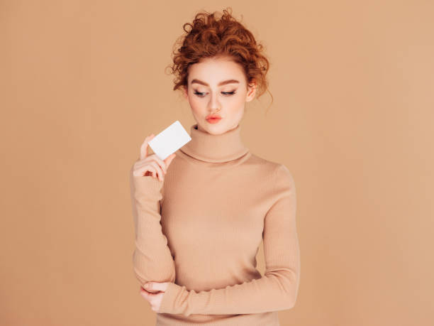 istock Beautiful woman holds placard 1236071259