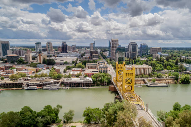 Sacramento Tower Bridge and Sacramento Capitol Mall High quality stock aerial view photo of Sacramento's Tower Bridge and the Sacramento River, looking towards the Capitol mall and building. sacramento photos stock pictures, royalty-free photos & images