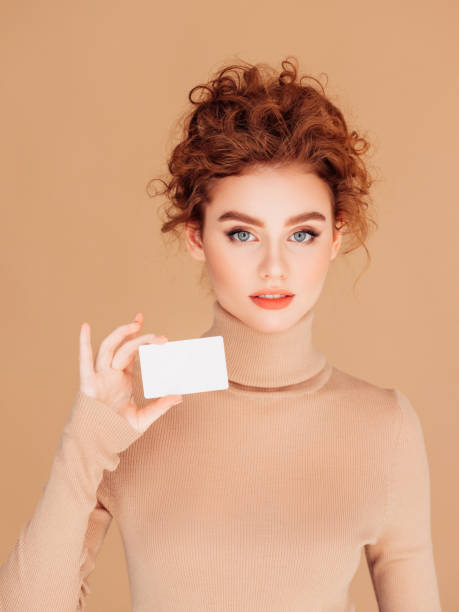 istock Beautiful woman holds placard 1236072301