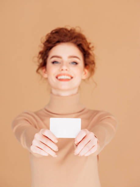 istock Beautiful woman holds placard 1236073867