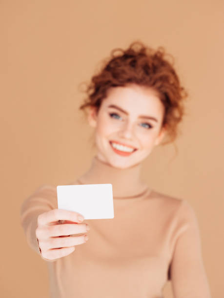 istock Beautiful woman holds placard 1236074931