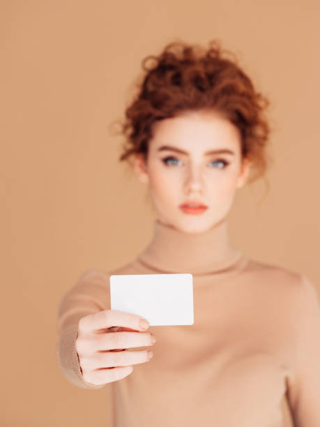 istock Beautiful woman holds placard 1236075993