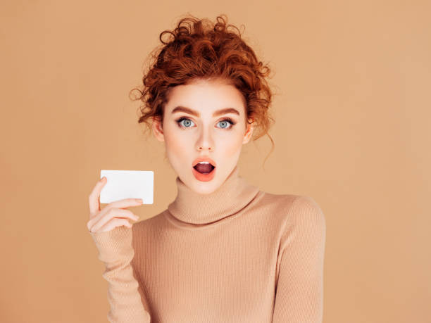 istock Beautiful woman holds placard 1236079491