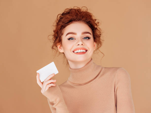 istock Beautiful woman holds placard 1236082884