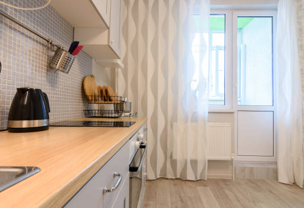 istock View of the kitchen and exit to the balcony in the background 1236223207