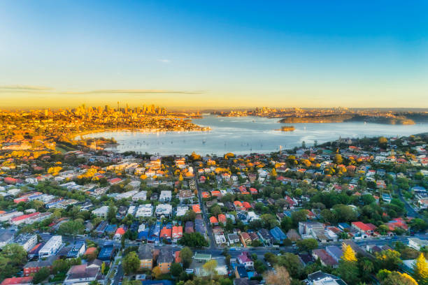 D Sy Double bay 2 CBD houses Wealthy Eastern suburbs of Sydney city around Harbour in aerial view with soft morning light and blue sky. sydney harbor photos stock pictures, royalty-free photos & images