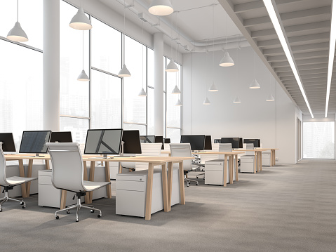 Modern style high ceiling office interior with city view 3d render.There are white wall,gray carpet floor ,decorate with wooden table.There are large windows looking out to see scenery outside.