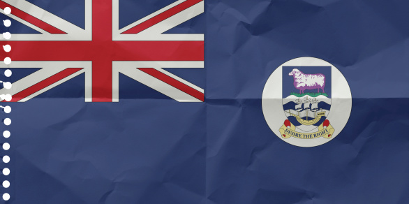 Falkland Islander flag on a sheet of paper torn out from a notebook.