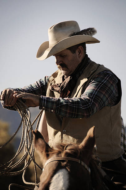 istock Cowboy fixing his lasso 123636547