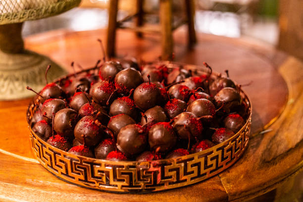 Chocolate candies. Chocolate candies arranged on plates on a table decorated for a party. casamento stock pictures, royalty-free photos & images