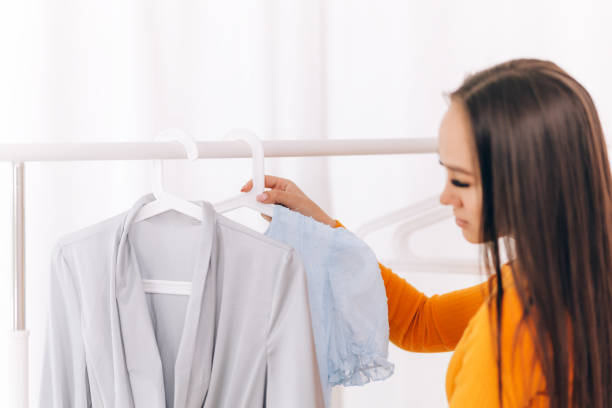 istock Girl chooses clothes 1236465611