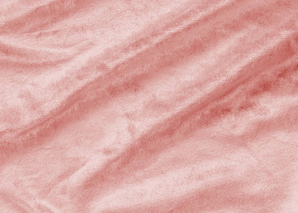 ゴールド ピンク ベルベット バック グラウンドの上昇や綿や柔らかいフワフワしたビロードのようなサテン生地布メタリック カラー素材とウールで作られたベロア フランネル テクスチャ - felt textured textured effect textile ストックフォトと画像