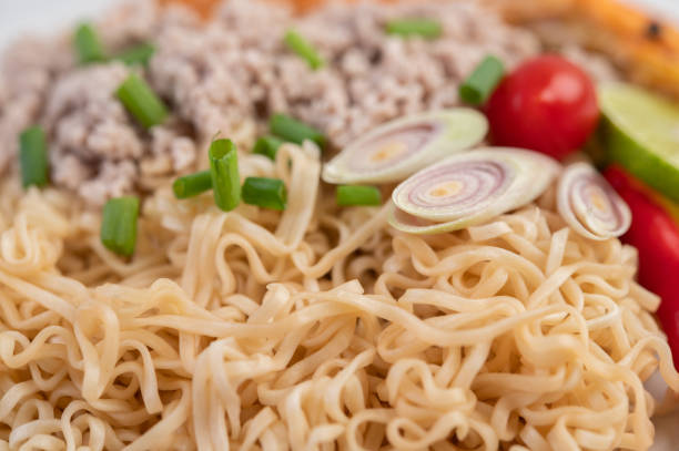 istock Close up with mum and minced pork with chili tomato and lime. 1236486109