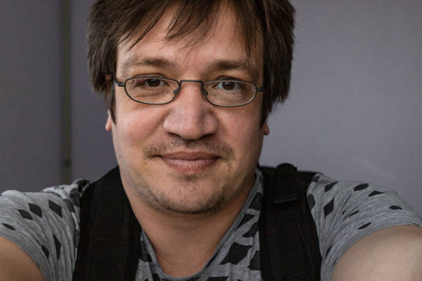istock Handsome man in glasses takes a selfie 1236496444