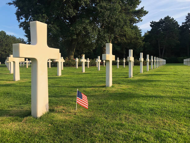 istock Cemetery crosses and flag 1236536516