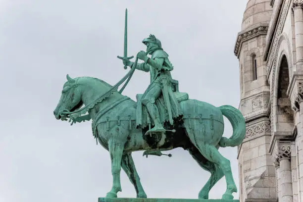 Equestrian statue of of Saint Joan of Arc at the Basilica of the Sacred Heart of Paris, at the summit of the butte Montmartre, the highest point in Paris, France