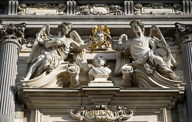 Detail (tympanum) of the facade of the famous Baroque Church of Carolus Borromeus in Antwerp.  Built between 1615 and 1621. Former Jesuit’s church. Based on the Gesù Church in Rome.