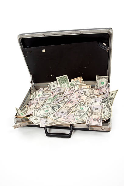 istock Old Briefcase Filled with Money 123658094