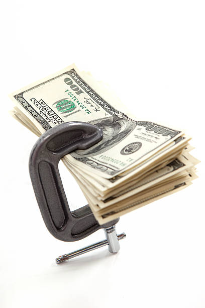 istock Money in a Vise 123658105