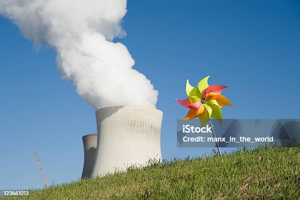 Foto de Energia Nuclear Contra O Vento e mais fotos de stock de Brinquedo - Brinquedo, Energia Eólica, Energia Nuclear
