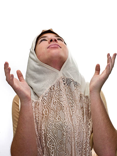 scuola ragazza musulmana pregare - milfeh foto e immagini stock